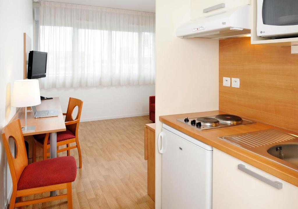 Séjours&Affaires Rennes Longs Champs Habitación foto